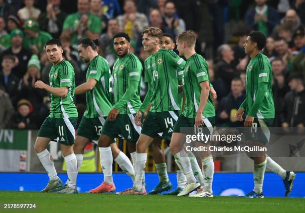 Isaac Price of Northern Ireland celebrates scoring his team's fourth goal with teammates during the UEFA Nations League 2024/25 League C Group C3...