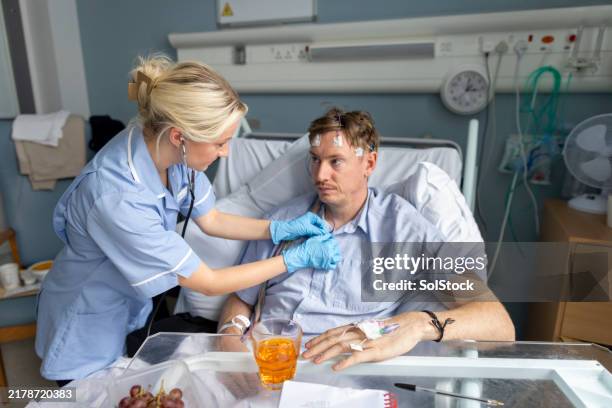 preparing to listen to heart - epilepsy stock pictures, royalty-free photos & images