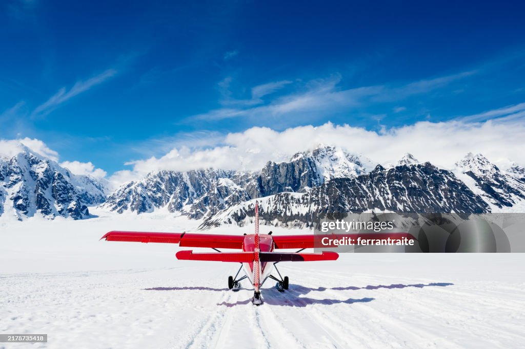 Propeller Ski-plane taking off of Denali Glacier