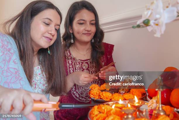 happy dashain - nepal’s most important holiday - beautiful plates for godess durga - worshiping to god before putting tika - nepal culture stock pictures, royalty-free photos & images