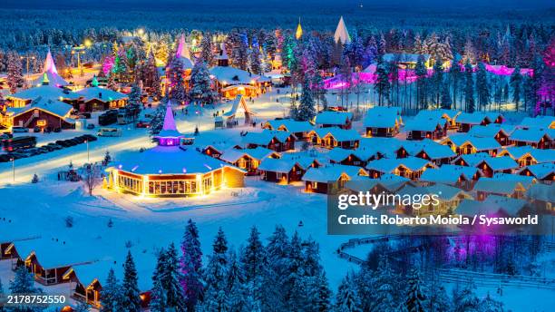 aerial view of the snowy santa claus village - aldea fotografías e imágenes de stock