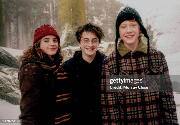 Actors Emma Watson Daniel Radcliffe and Rupert Grint on the set of the film 'Harry Potter and The Prisoner of Azkaban', London, England, 2003