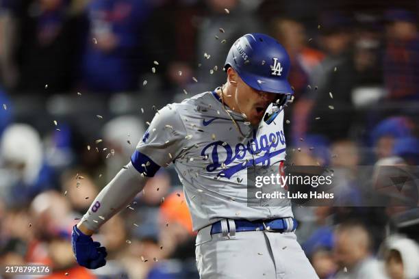 Enrique Hernández of the Los Angeles Dodgers celebrates after hitting a home run in the sixth inning against the New York Mets during Game Three of...