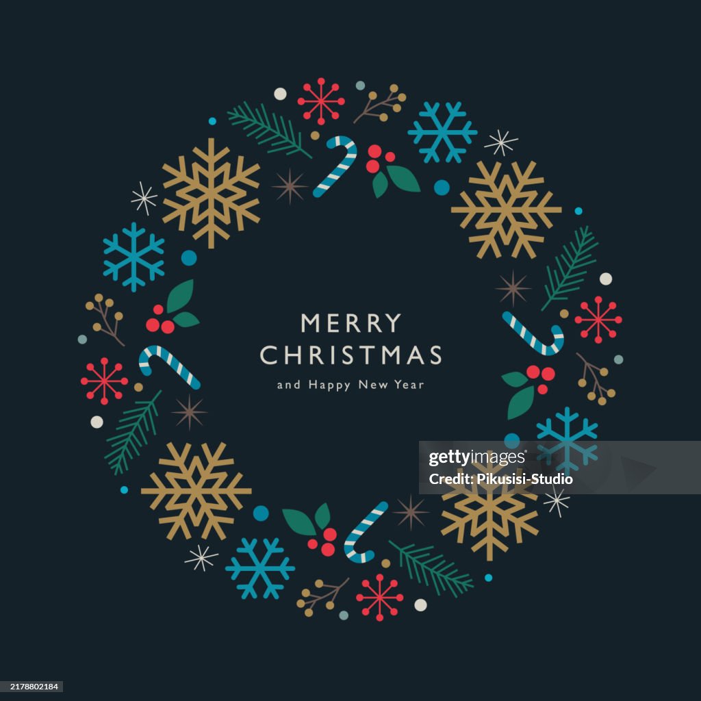 Festive Christmas wreath with snowflakes, pine branches, candy cane and red berries
