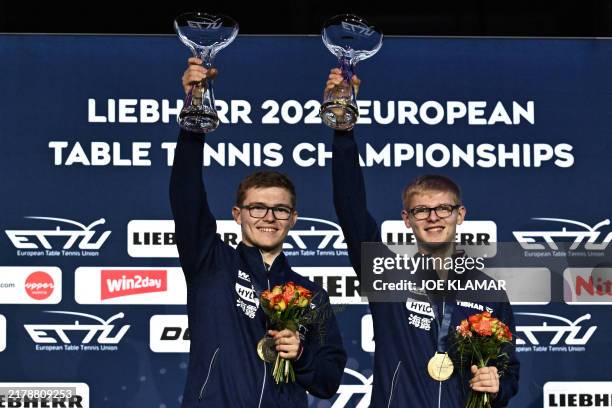 France's Alexis Lebrun and Felix Lebrun celebrate their gold medals in men's doubles of the 2024 European Table Tennis Championships at Tips Arena...