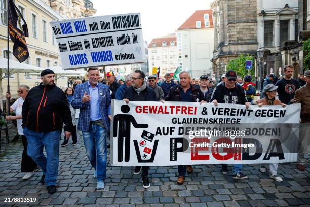 Lutz Bachmann , founder of the anti-Muslim immigration Pegida movement, and former Austrian vice-chancellor Heinz-Christian Strache take part in the...