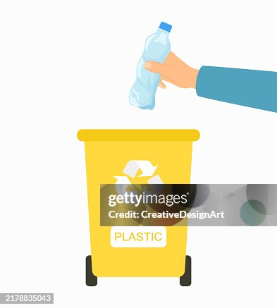 Hand Throwing Away Empty Plastic Bottle Into Recycle Bin. Environmental Conservation And Recycling Concept Hand Throwing Away Empty Plastic Bottle Into Recycle Bin. Environmental Conservation And Recycling Concept