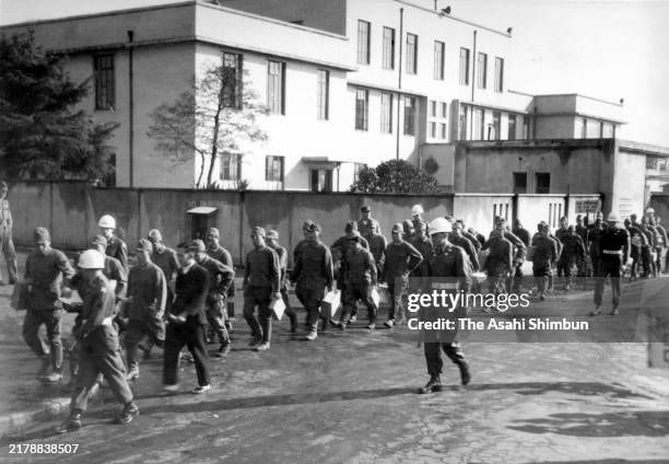 Japanese war criminals leave the Sugamo Prison after their release with the Christmas pardon on December 28, 1949 in Tokyo, Japan.