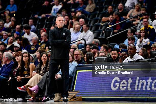 Head coach Michael Malone of the Denver Nuggets looks on in a game against the Oklahoma City Thunder at Ball Arena on October 15, 2024 in Denver,...