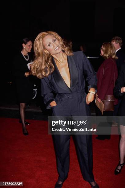 American actress, singer and model Beverly Johnson, wearing a black jumpsuit with a plunging neckline, attends the 15th Annual CableACE Awards at the...