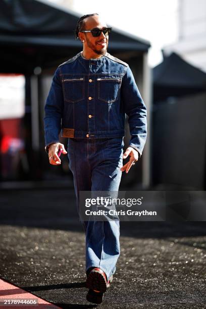 Lewis Hamilton of Great Britain and Mercedes walks in the Paddock during previews ahead of the F1 Grand Prix of United States at Circuit of The...