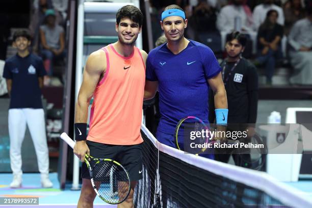 Carlos Alcaraz of Spain and Rafael Nadal of Spain pose prior to their Semi Final match during day two of the Six Kings Slam 2024 at Kingdom Arena on...