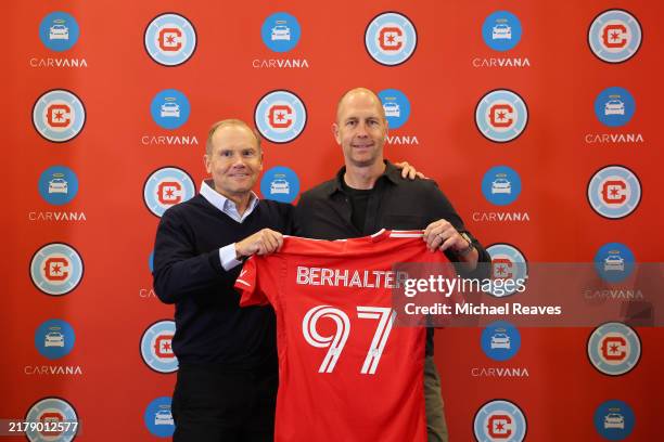 New coach Gregg Berhalter of the Chicago Fire poses for a photo with owner Joe Mansueto during a press conference at Waldorf Astoria Chicago on...