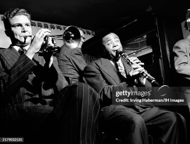 American jazz trumpeter Max Kaminsky and American jazz clarinetist Sidney Bechet play at Jimmy Ryan's Jazz Club in New York, New York, November 28,...