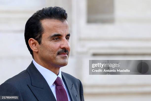 Emir of Qatar Tamim bin Hamad Al Thani meets with Italian Prime Minister Giorgia Meloni before their meeting at Villa Doria Pamphilj, on October 21,...