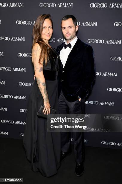 Domino Kirke and Penn Badgley attend the Giorgio Armani Women's SS25 Fashion Show and Afterparty at Park Avenue Armory on October 17, 2024 in New...