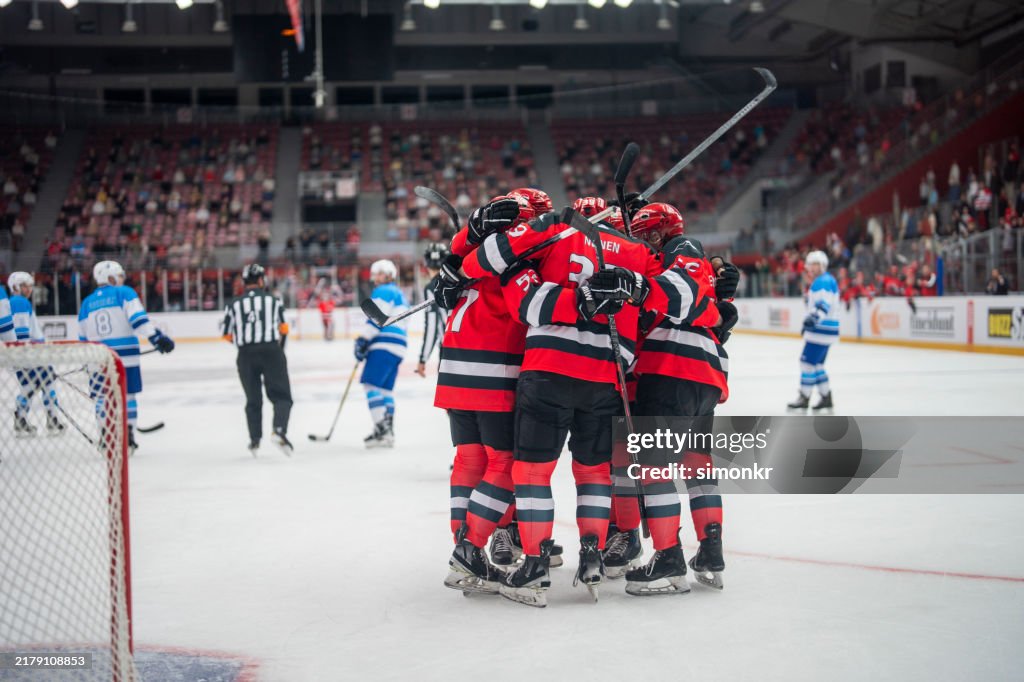 Ice Hockey Team Celebrates After Scoring
