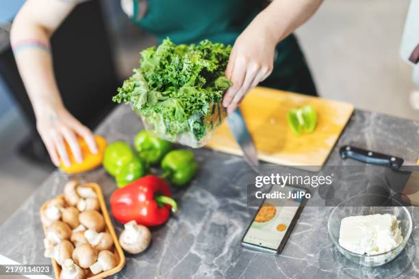 cooking using mobile - condiment stock pictures, royalty-free photos & images