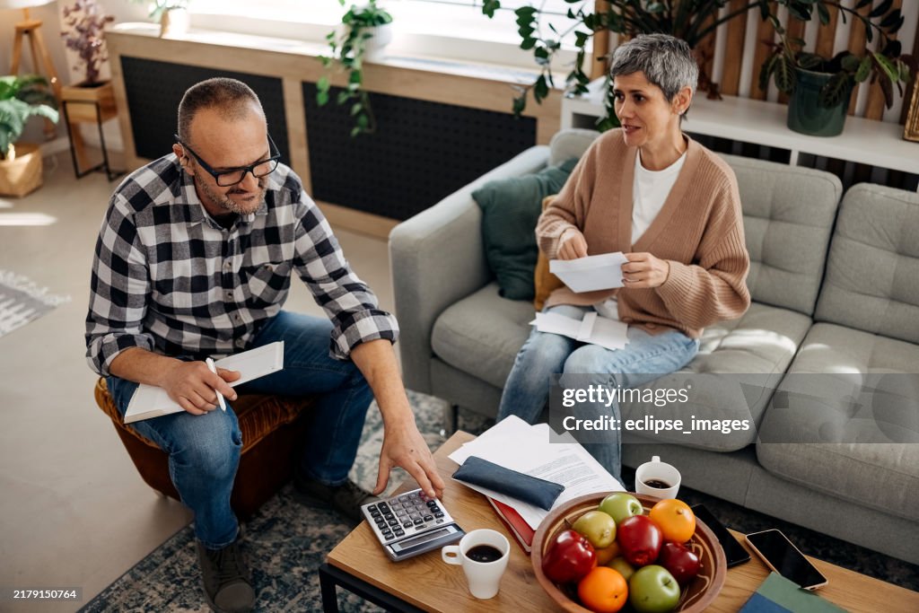 Couple managing household budget together