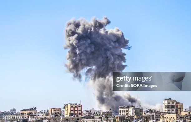 Clouds of smoke rise after heavy shelling by Israel on Jabalia camp in the northern Gaza Strip.