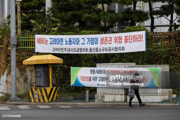 Banners against MBK Groups' takeover bit hang outside a Korea Zinc Co. Smelting factory in Ulsan, South Korea, on Monday, Oct. 21, 2024. The bitter...