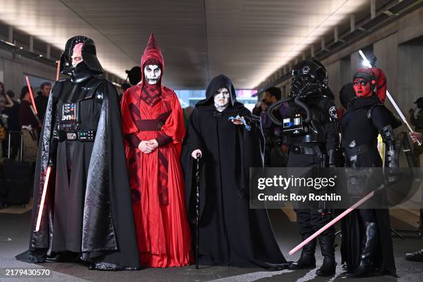 Cosplayers pose as Star Wars Characters during New York Comic Con 2024 at The Jacob K. Javits Convention Center on October 18, 2024 in New York City.
