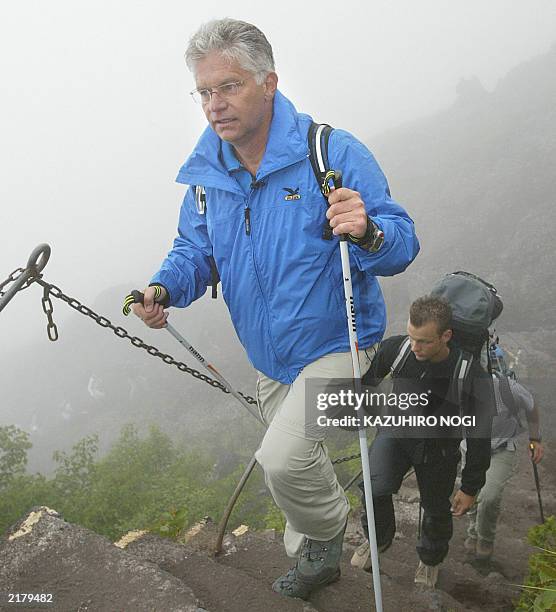 Hartwig Gauder , former German Olympic champion, climbs Mt. Fuji with a transplanted heart to appeal to the people to become donors for internal...