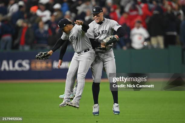 Aaron Judge of the New York Yankees and Juan Soto of the New York Yankees celebrate after the Yankees defeated the Cleveland Guardians, 8-6, in Game...
