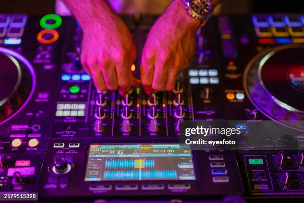 dj spend night time for work at night club. - equalizer bars stock pictures, royalty-free photos & images