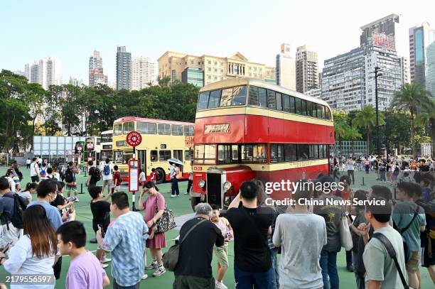 People visit the Bus Parade cum Exhibition for Celebrating the 75th Anniversary of the Founding of the People'S Republic of China at Victoria Park on...