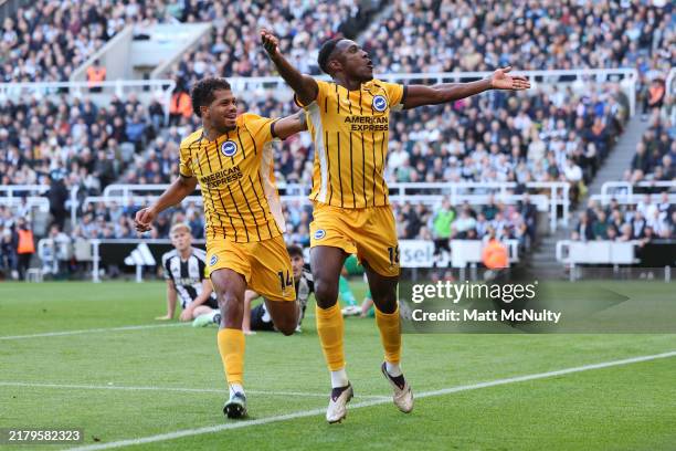Danny Welbeck of Brighton & Hove Albion celebrates scoring his team's first goal with teammate Georginio Rutter during the Premier League match...