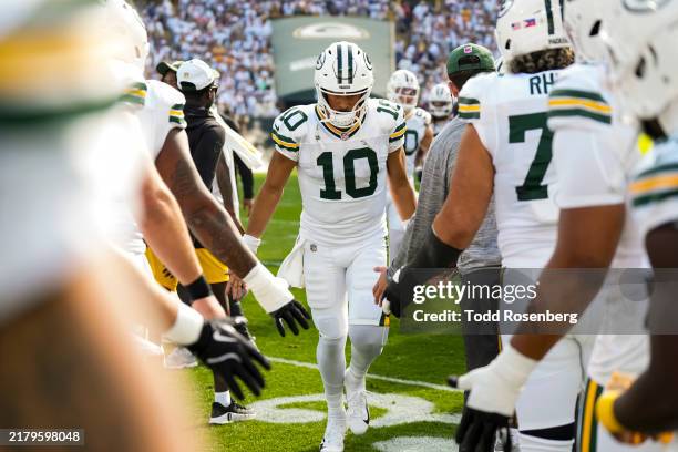Quarterback Jordan Love of the Green Bay Packers enters the field prior to an NFL football game against the Houston Texans, at Lambeau Field on...