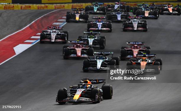 Max Verstappen of the Netherlands driving the Oracle Red Bull Racing RB20 leads the field at the start during the Sprint ahead of the F1 Grand Prix...