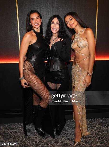 Dua Lipa, Cher and Zendaya are seen backstage at the 2024 Rock & Roll Hall Of Fame Induction Ceremony streaming on Disney+ at Rocket Mortgage...