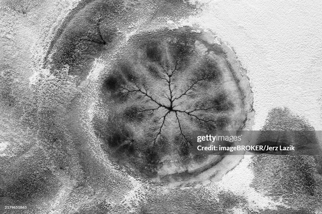 Drone view. Abstract forms created on surface of freezing lake
