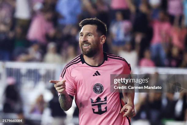 Lionel Messi of Inter Miami celebrates scoring his third goal during the second half against the New England Revolution at Chase Stadium on October...