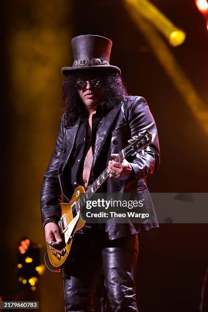 Slash performs onstage during the 2024 Rock & Roll Hall Of Fame Induction Ceremony streaming on Disney+ at Rocket Mortgage Fieldhouse on October 19,...