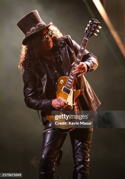 Slash performs onstage during the 2024 Rock & Roll Hall Of Fame Induction Ceremony streaming on Disney+ at Rocket Mortgage Fieldhouse on October 19,...