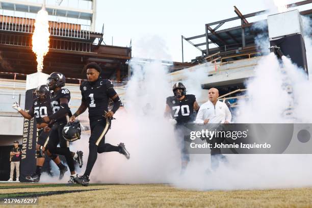 Taylor of the Vanderbilt Commodores leads the team out prior to the game against the Ball State Cardinals at FirstBank Stadium on October 19, 2024 in...