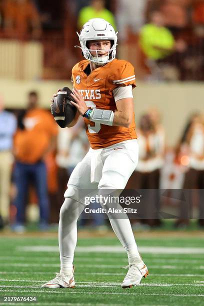 Quinn Ewers of the Texas Longhorns throws the ball during the third quarter against the Georgia Bulldogs at Darrell K Royal-Texas Memorial Stadium on...
