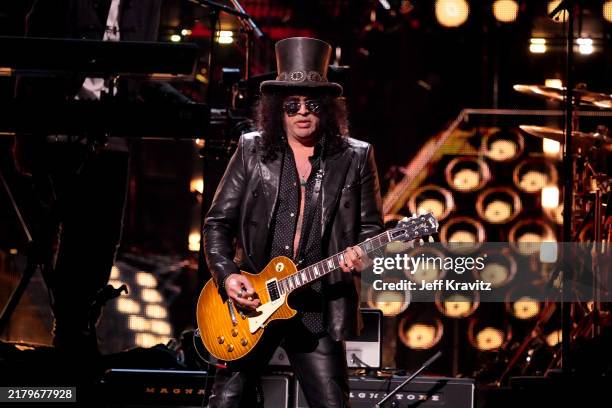 Slash performs onstage at the 2024 Rock & Roll Hall Of Fame Induction Ceremony at Rocket Mortgage Fieldhouse on October 19, 2024 in Cleveland, Ohio.