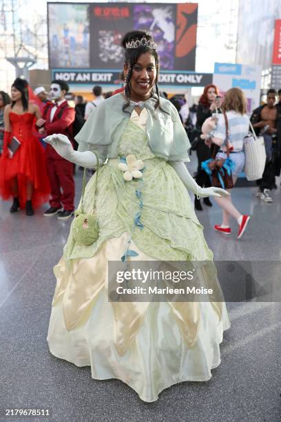 Cosplayer dressed as Princess Tiana poses during the 2024 New York Comic Con at Jacob Javitz Center on October 19, 2024 in New York City.