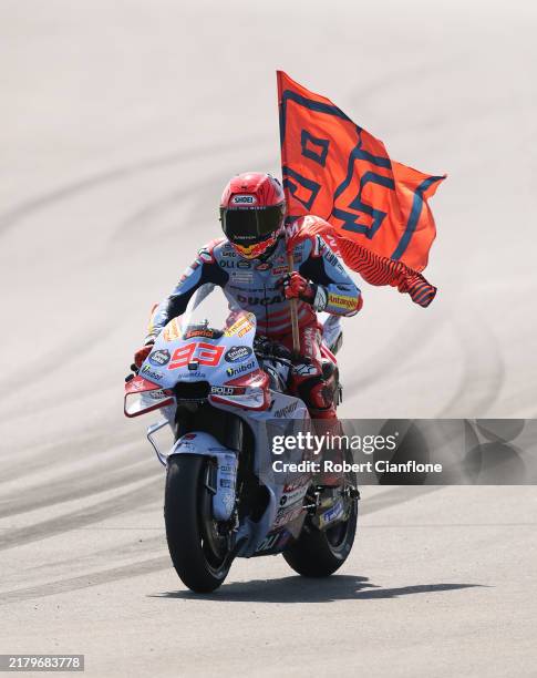 Marc Marquez of Spain and the Gresini Racing MotoGP celebrates after winning the MotoGP Of Australia at Phillip Island Grand Prix Circuit on October...