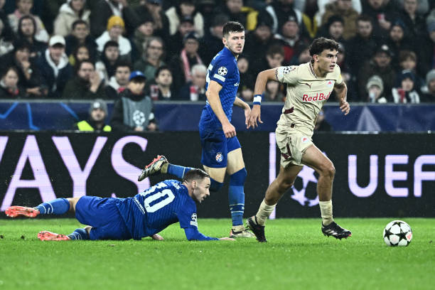 Stefan Bajcetic of Salzburg takes a ball from player of GNK Dinamo Marko Rog during the UEFA Champions League 2024/25 League Phase MD3 match between...