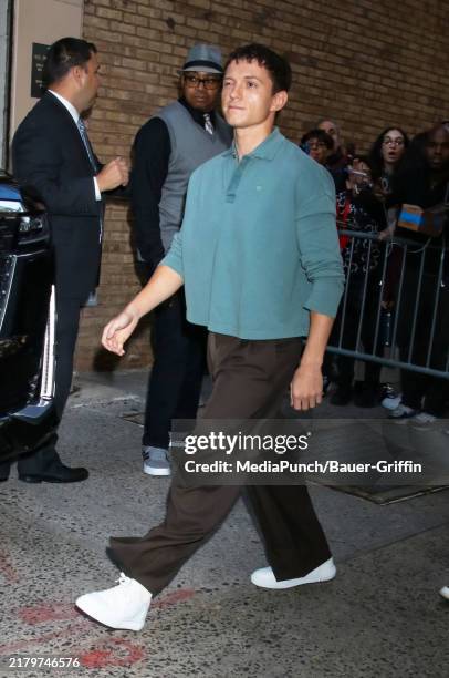 Tom Holland is arriving at the "LIVE with Kelly and Mark" show on October 23, 2024 in New York City.