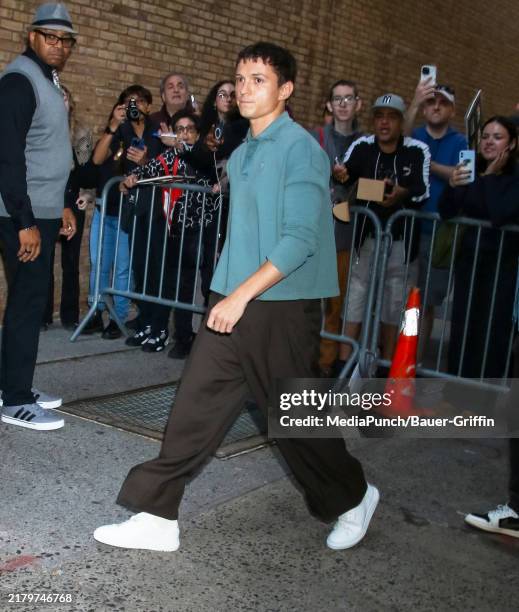Tom Holland is arriving at the "LIVE with Kelly and Mark" show on October 23, 2024 in New York City.
