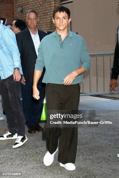 Tom Holland is arriving at the "LIVE with Kelly and Mark" show on October 23, 2024 in New York City.