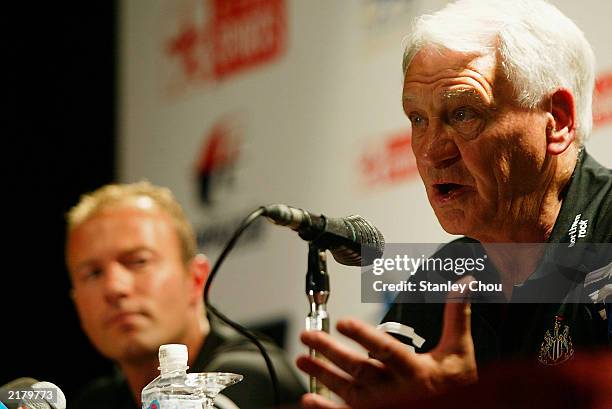 Sir Bobby Robson, manager of Newcastle United speaks to the press while captain, Alan Shearer looks on during a press conference held at the...