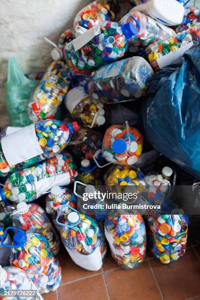 sorting and recycling plastic caps: a step toward zero waste - biodegradable stock pictures, royalty-free photos & images