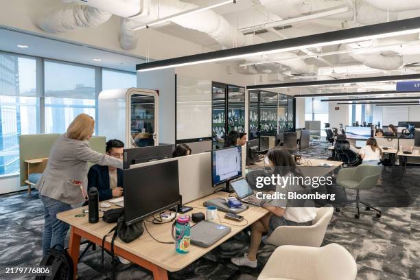 Employees at the LinkedIn Corp. Offices in Singapore, on Thursday, Oct. 17, 2024. Acquired by Microsoft in 2016 for $26 billion, LinkedIn has pushed...